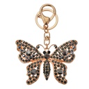 Sleutelhanger 6x2x8 cm goudkleurig