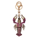 Sleutelhanger 5x2x9 cm goudkleurig