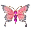 Broche vlinder roze